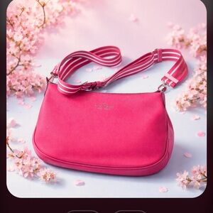 Pink pebbled leather Kate Spade Crossbody bag